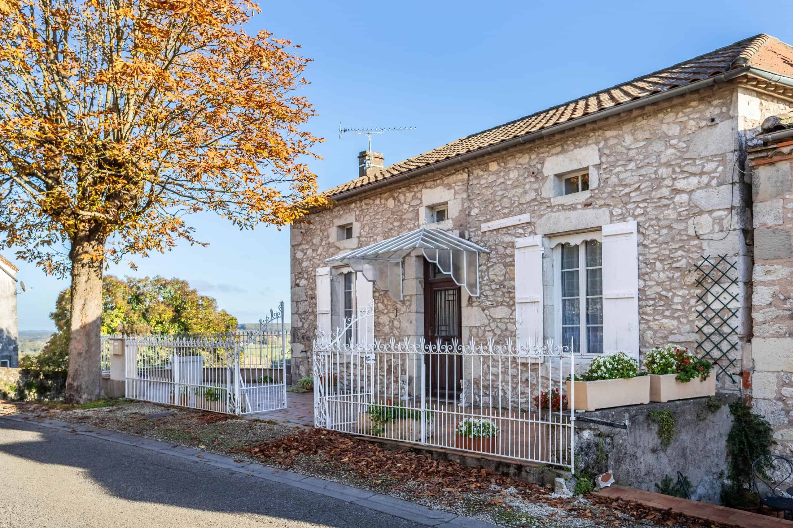 Village house with garden and view